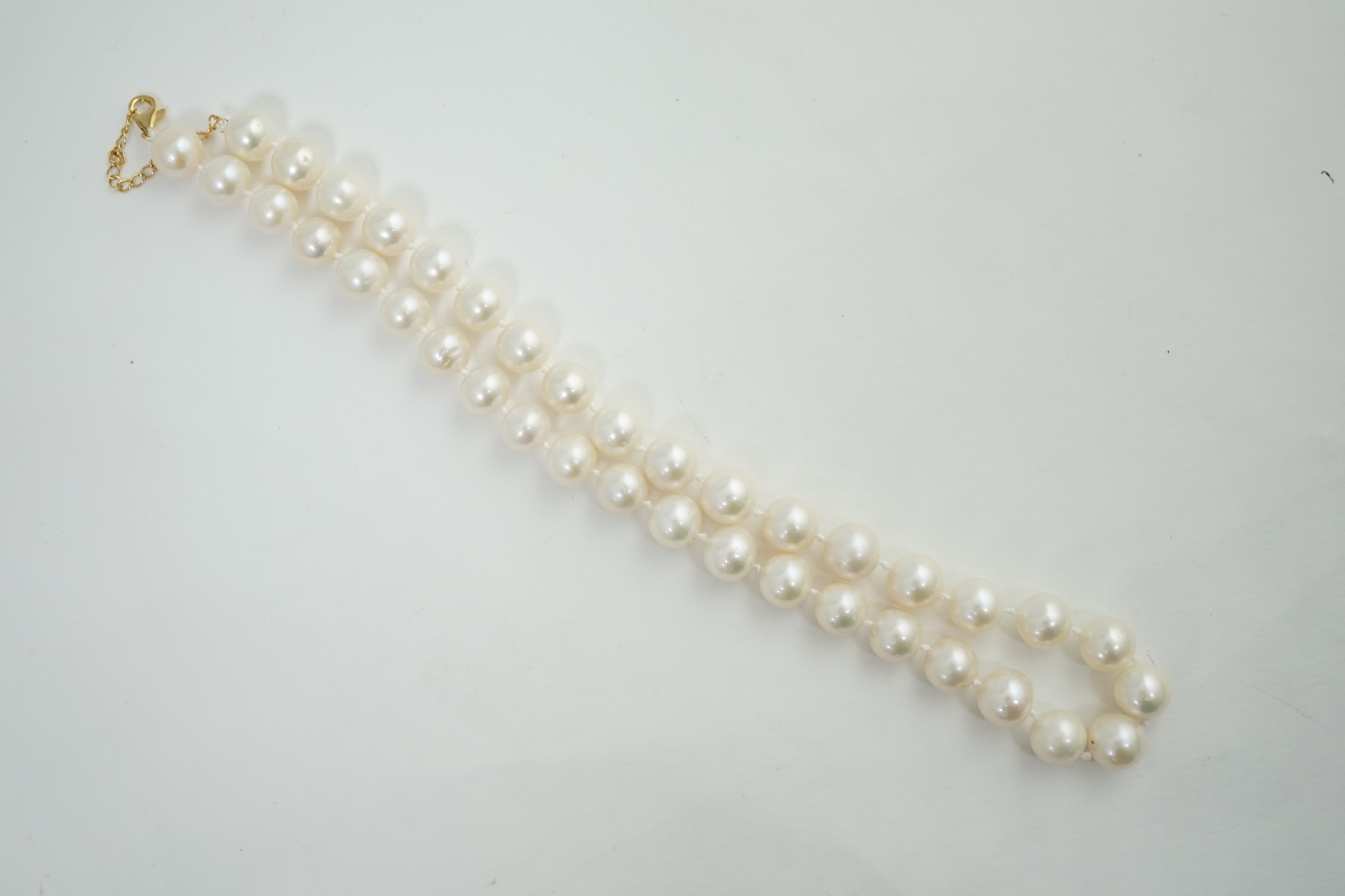 A single strand graduated South Sea pearl necklace, with 18k gold chain and clasp